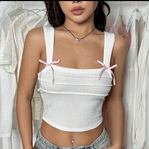 White Sleeveless Top with Pink Accents